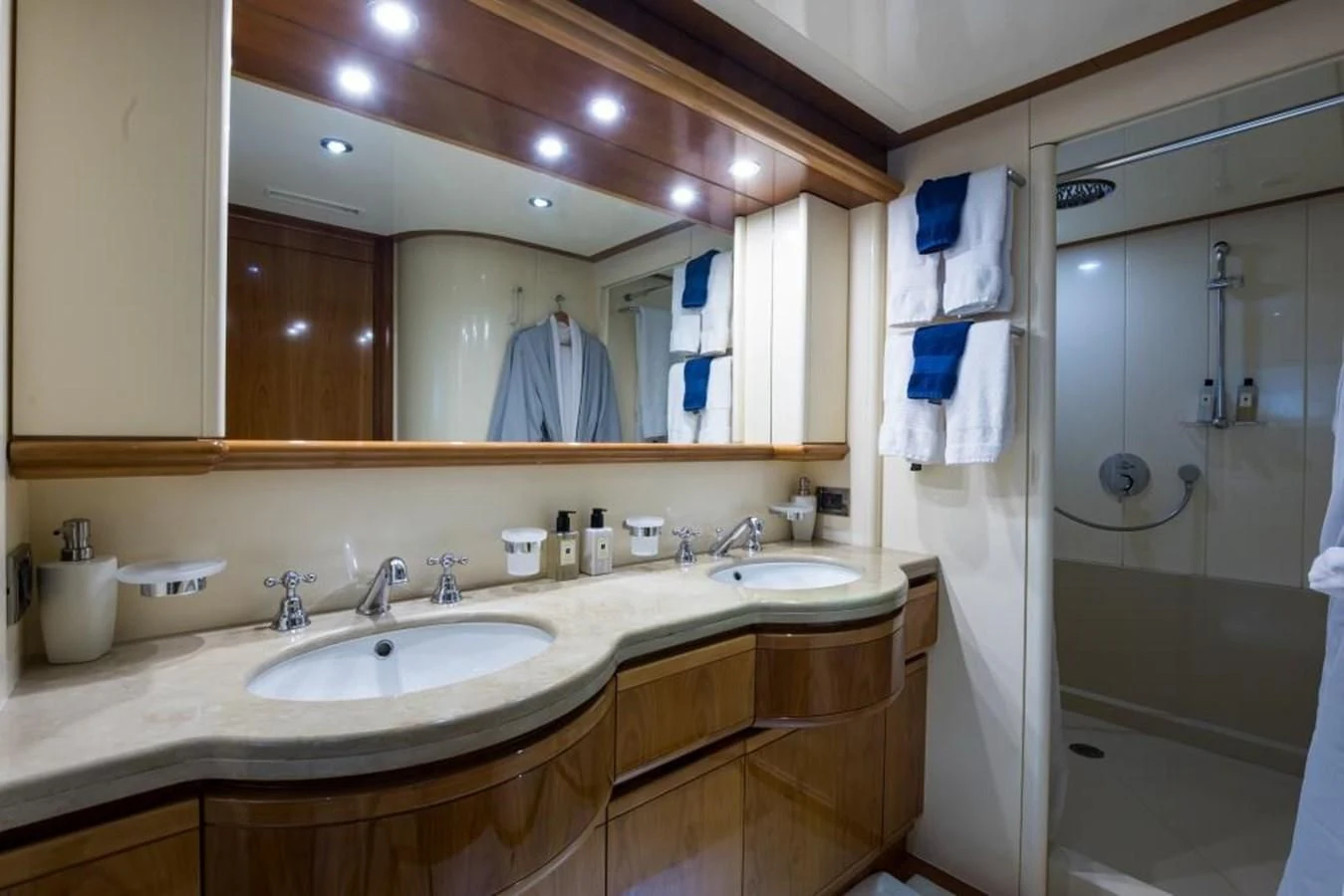 a bathroom with a large mirror aboard TOMORROW WE RIDE Yacht for Sale