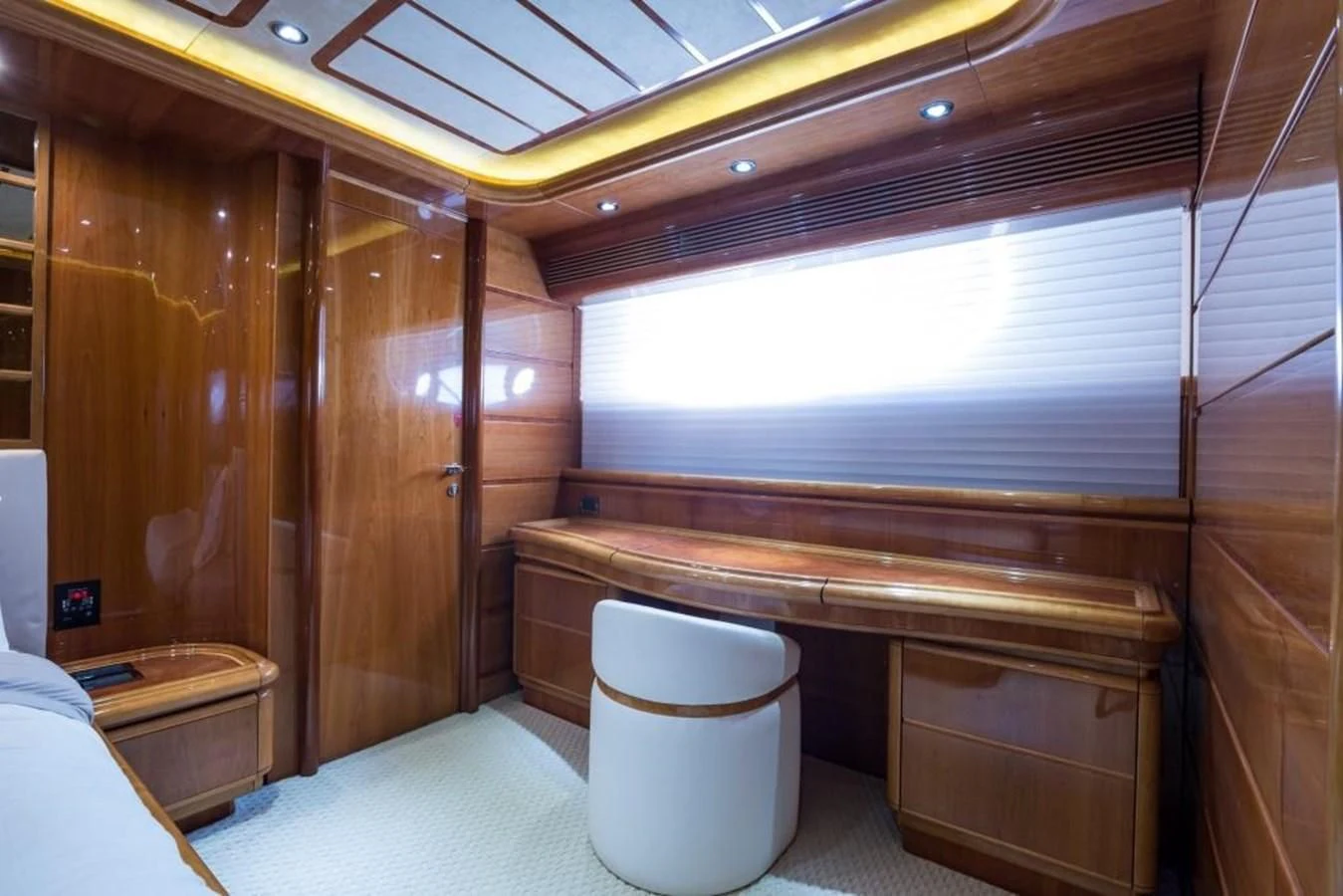 a bathroom with a toilet and a large wooden cabinet aboard TOMORROW WE RIDE Yacht for Sale