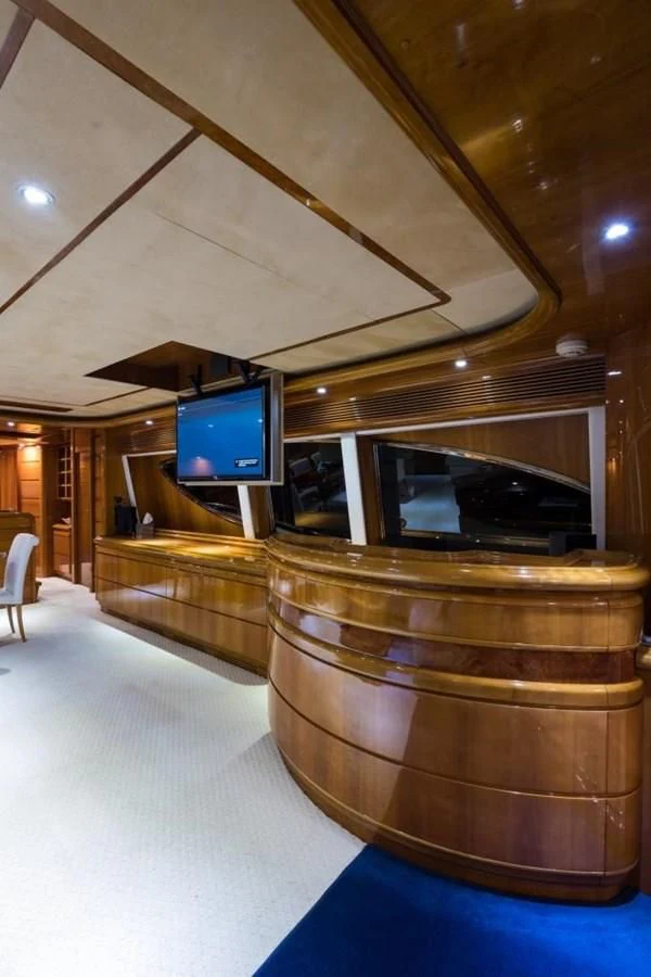 a large room with a tv aboard TOMORROW WE RIDE Yacht for Sale