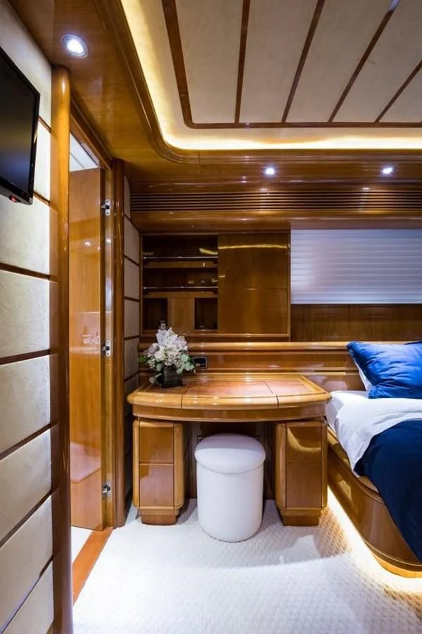 a bathroom with a wood cabinet aboard TOMORROW WE RIDE Yacht for Sale