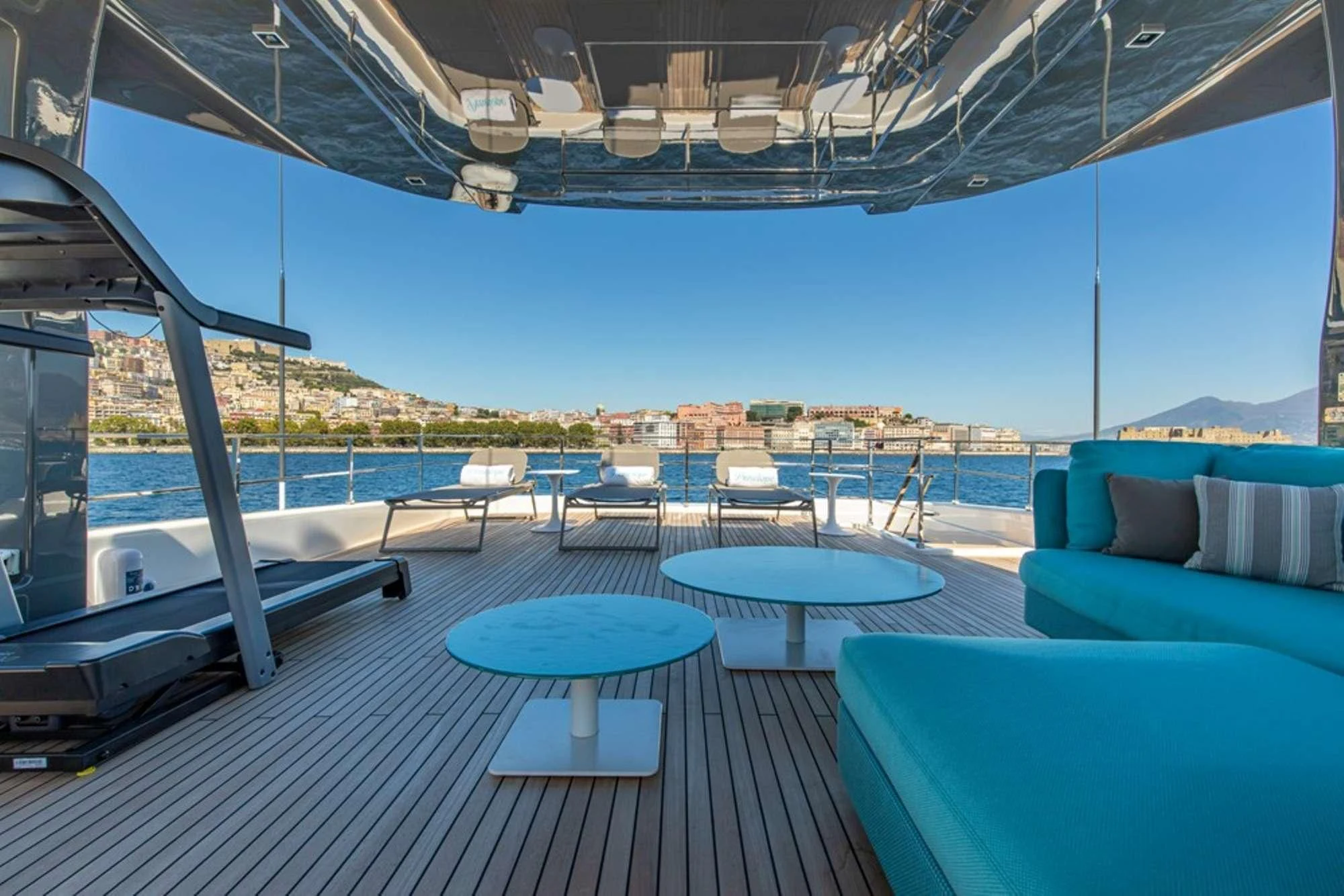 a pool with a table and chairs aboard SOUTH Yacht for Sale