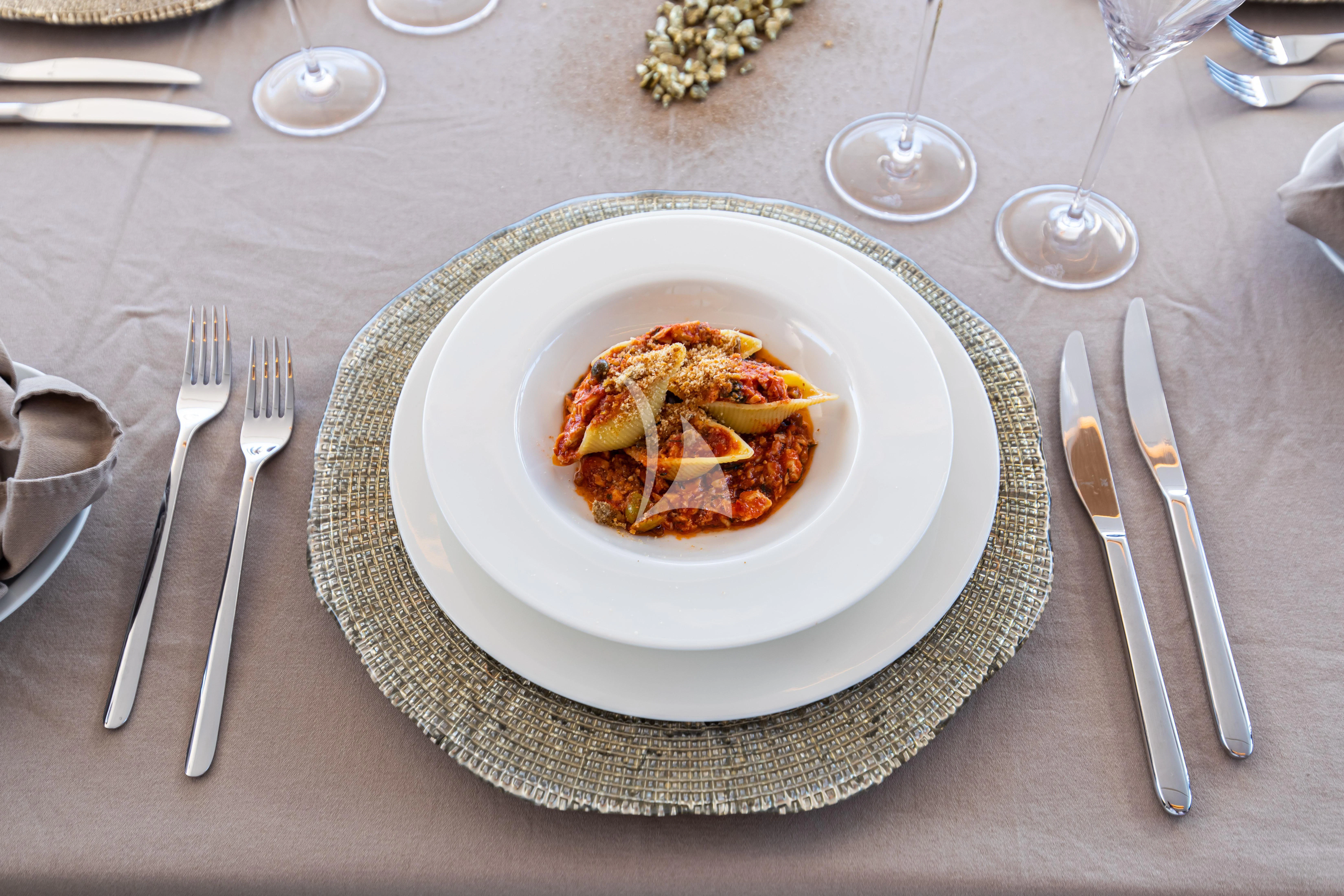 a plate of food aboard SOUTH Yacht for Sale