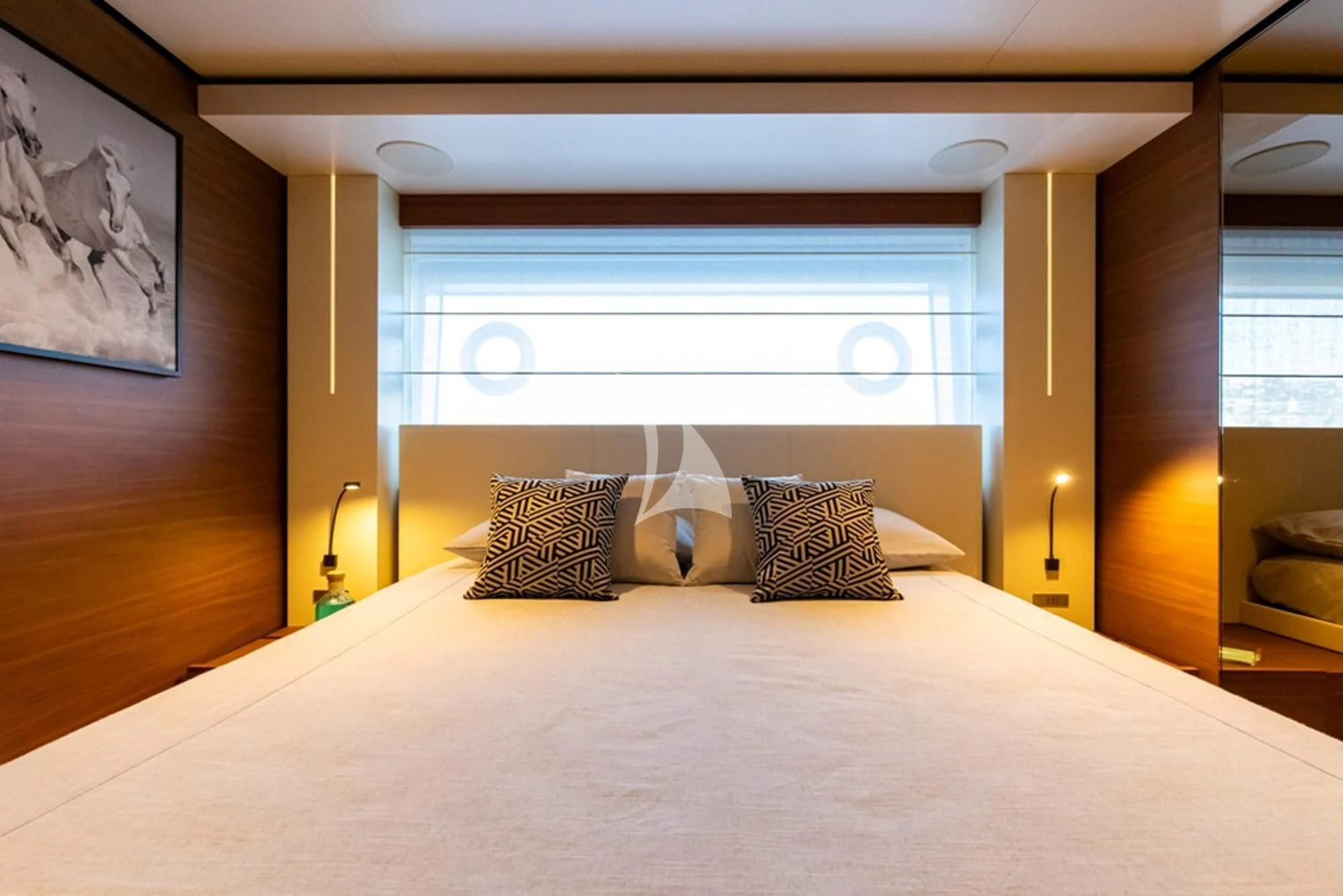 a bed with pillows aboard SOUTH Yacht for Sale