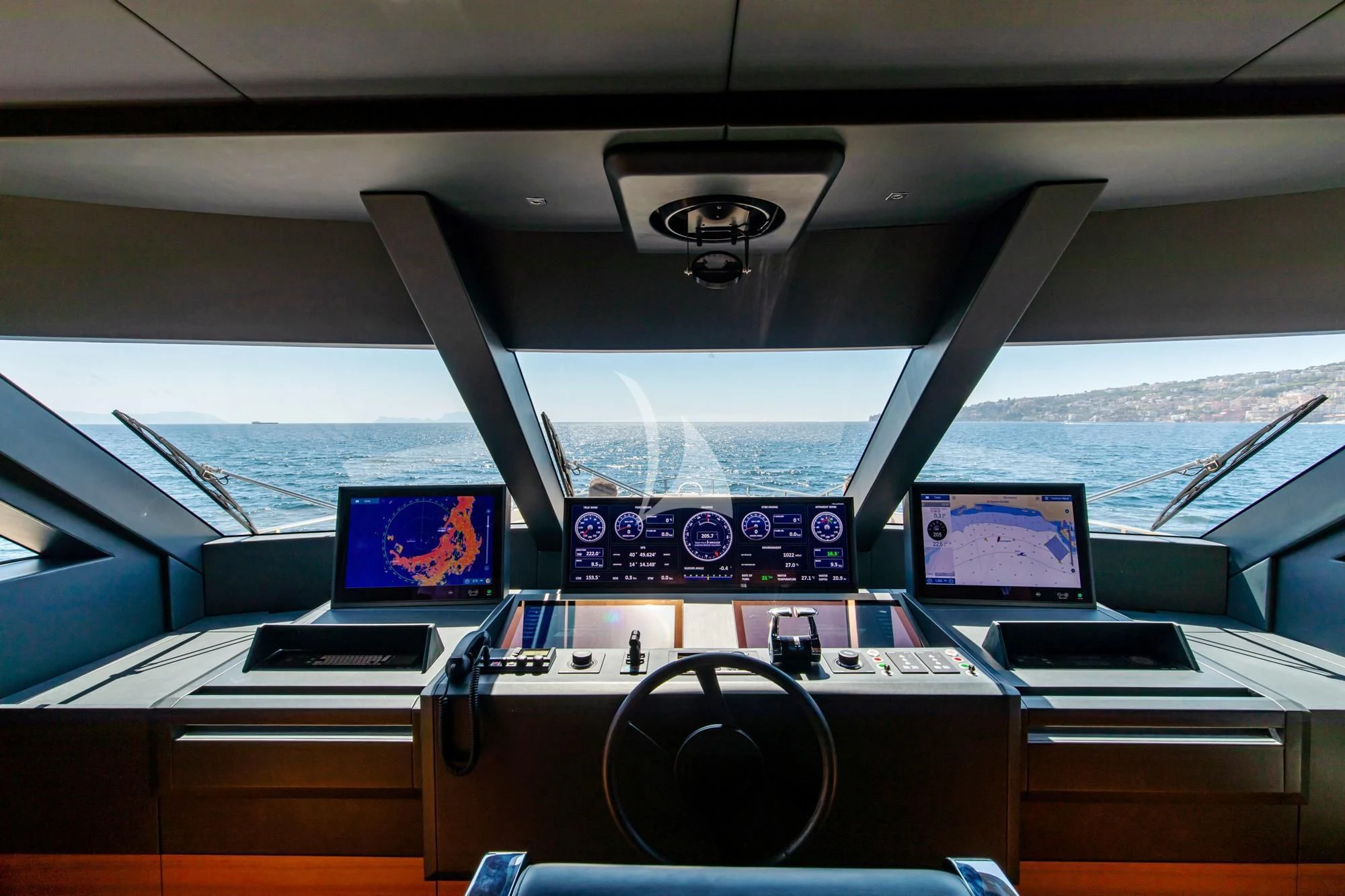 a view of a plane's cockpit with many screens aboard SOUTH Yacht for Sale