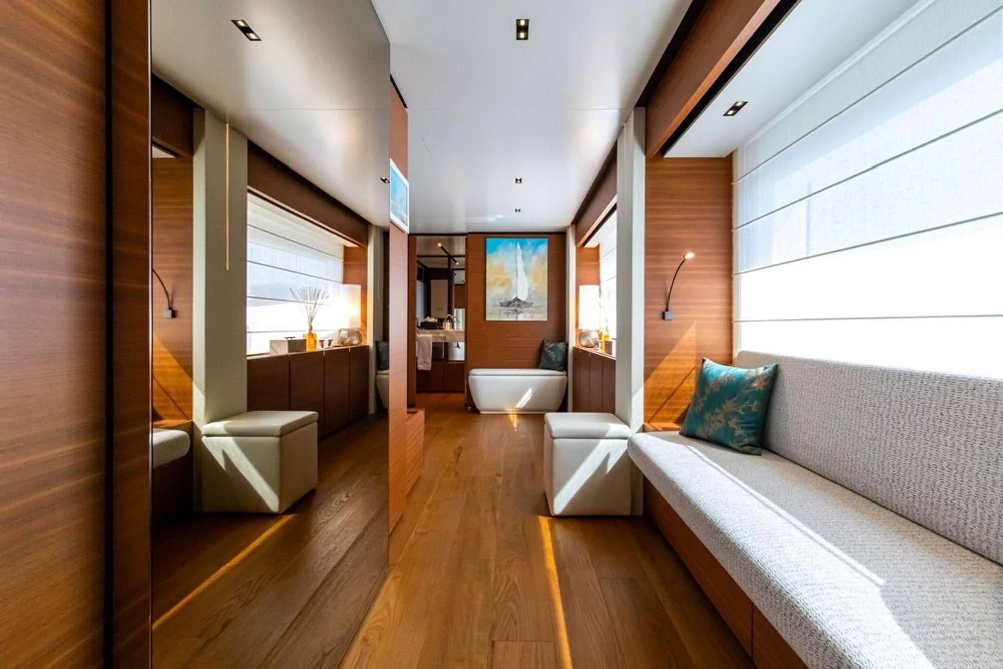 a room with a bed and a couch aboard SOUTH Yacht for Sale