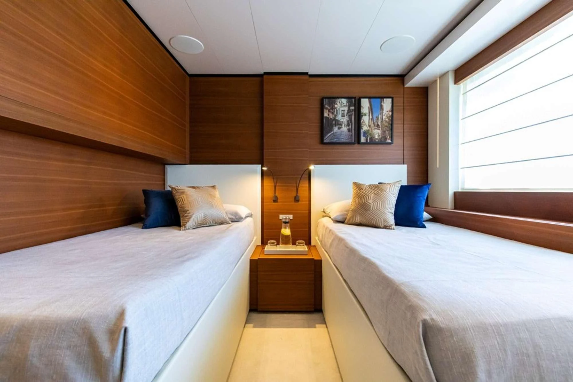 a couple of beds in a room aboard SOUTH Yacht for Sale