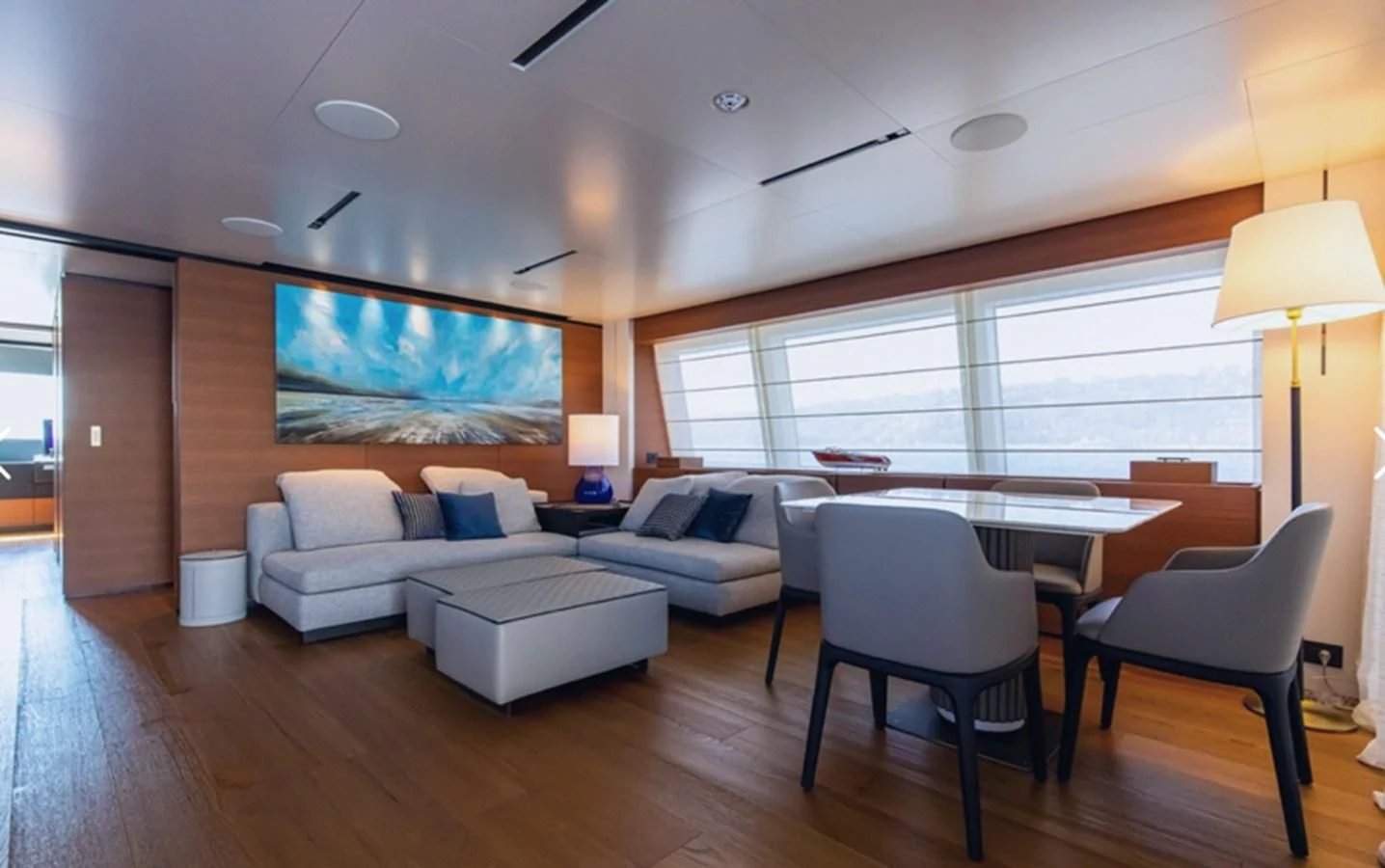 a living room with a large screen aboard SOUTH Yacht for Sale