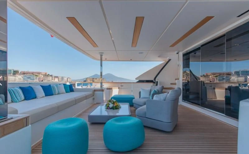 a living room with a large open roof aboard SOUTH Yacht for Sale