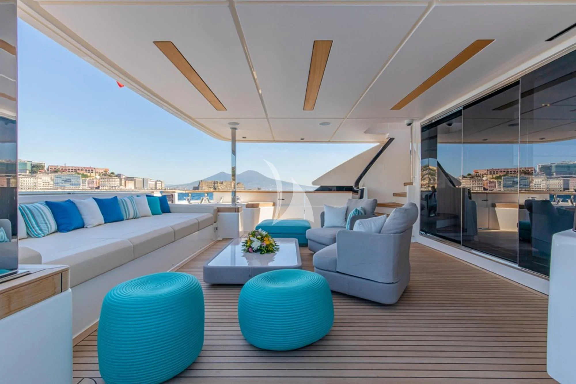 a living room with a large open roof aboard SOUTH Yacht for Sale
