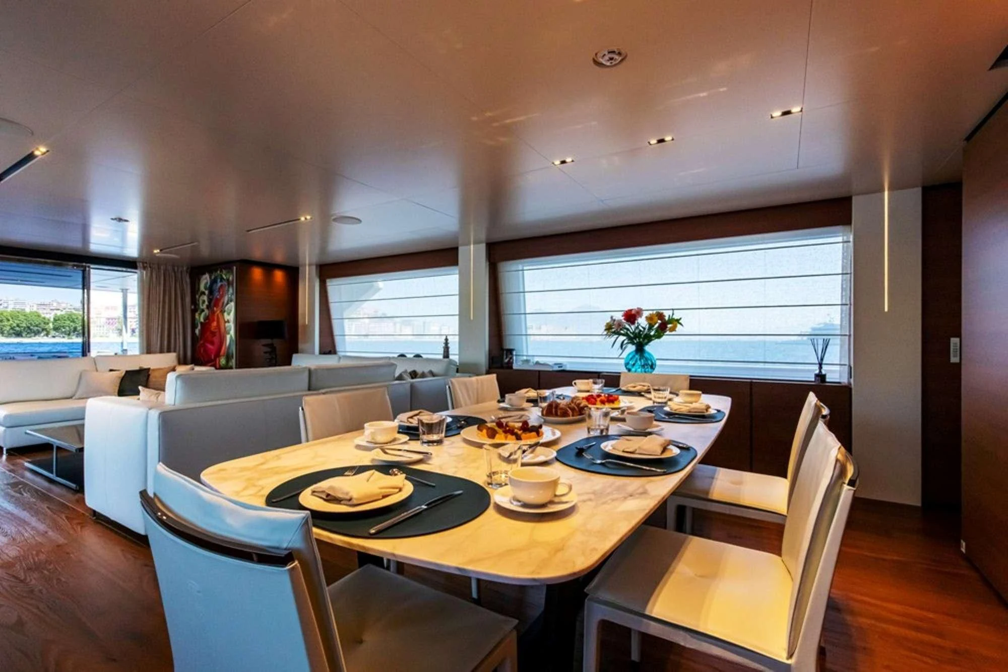 a dining table set for a meal aboard SOUTH Yacht for Sale