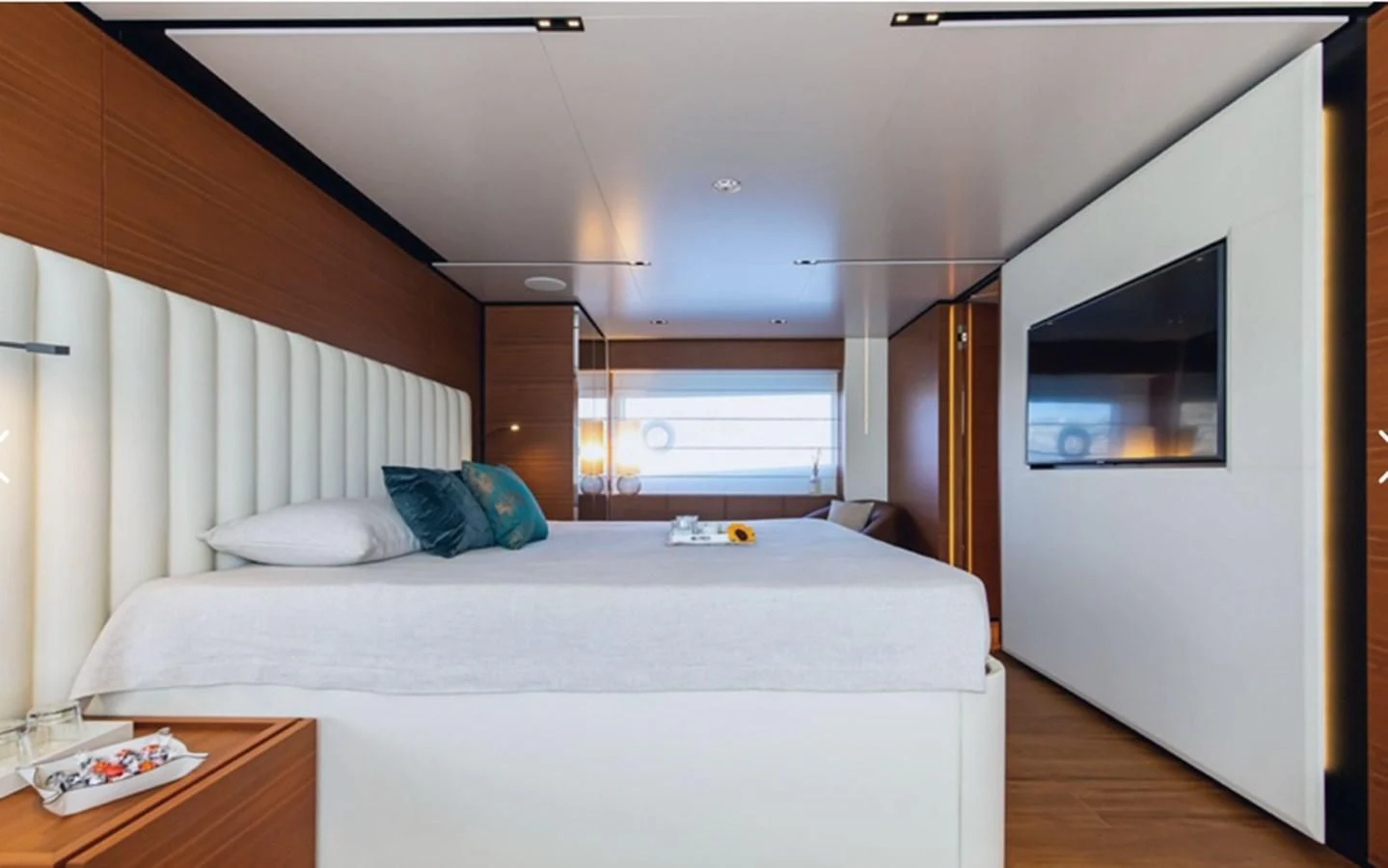 a bedroom with a large bed aboard SOUTH Yacht for Sale