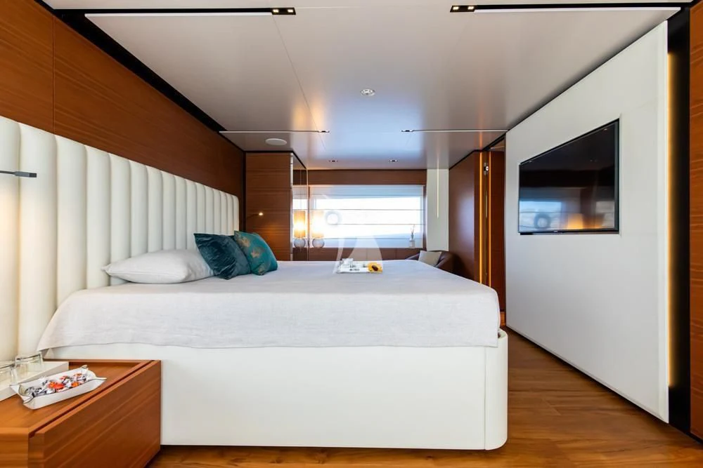 a bedroom with two beds aboard SOUTH Yacht for Sale