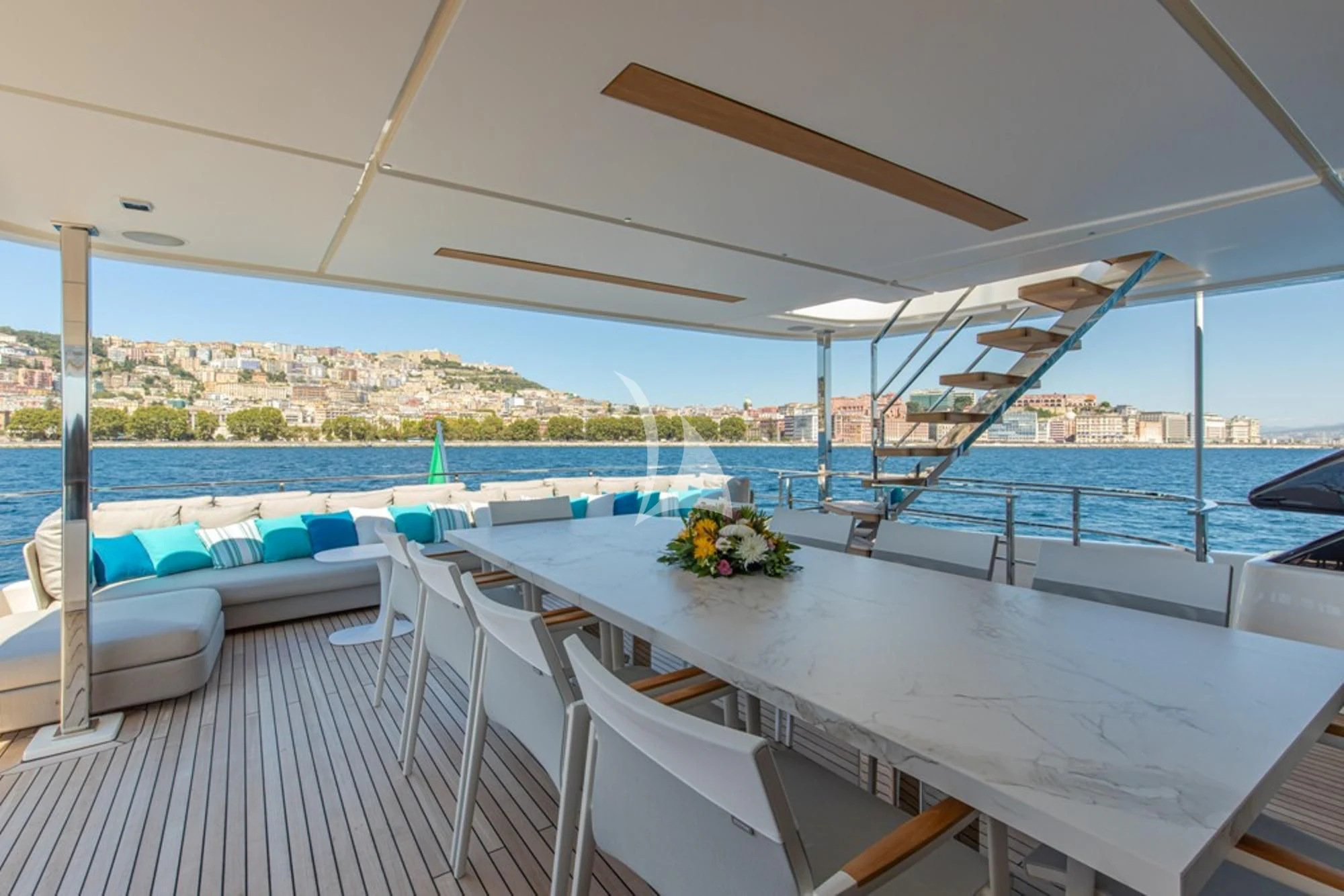 a room with a table and chairs aboard SOUTH Yacht for Sale