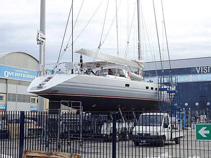 a boat docked at a pier aboard DIABLESSE Yacht for Sale