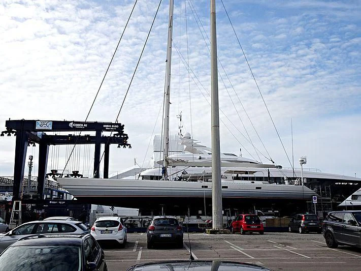 a large white boat on a dock aboard DIABLESSE Yacht for Sale