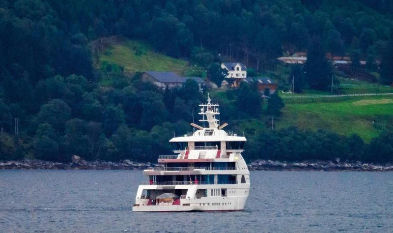 a large white boat on the water aboard OLIVIA O Yacht for Sale