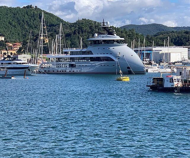 a large white ship in the water aboard OLIVIA O Yacht for Sale