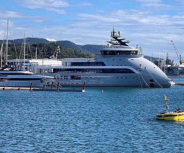 a large white ship in the water aboard OLIVIA O Yacht for Sale