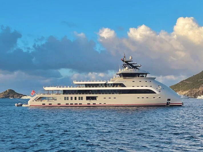 a large white ship in the water aboard OLIVIA O Yacht for Sale