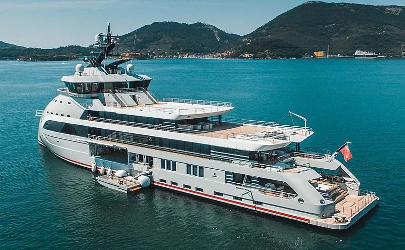 a large ship in the water aboard OLIVIA O Yacht for Sale