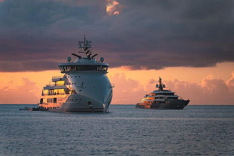 a couple of large ships in the water aboard OLIVIA O Yacht for Sale