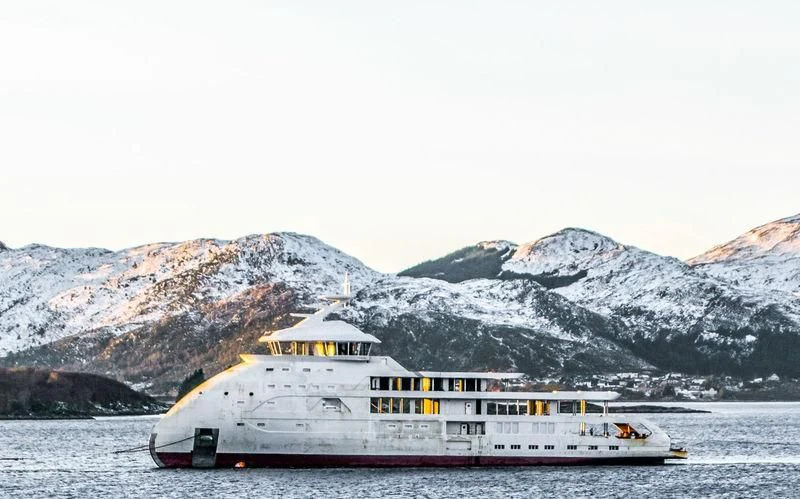 a large ship in the water aboard OLIVIA O Yacht for Sale