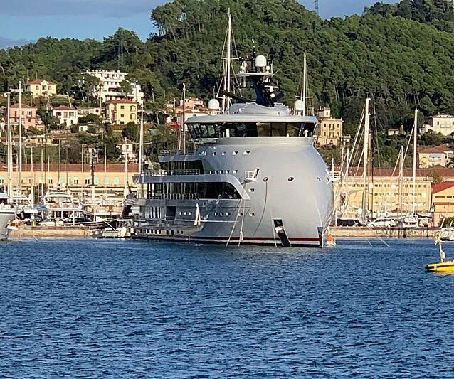 a large white ship in the water aboard OLIVIA O Yacht for Sale