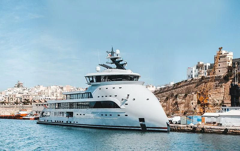 a large white boat in the water aboard OLIVIA O Yacht for Sale