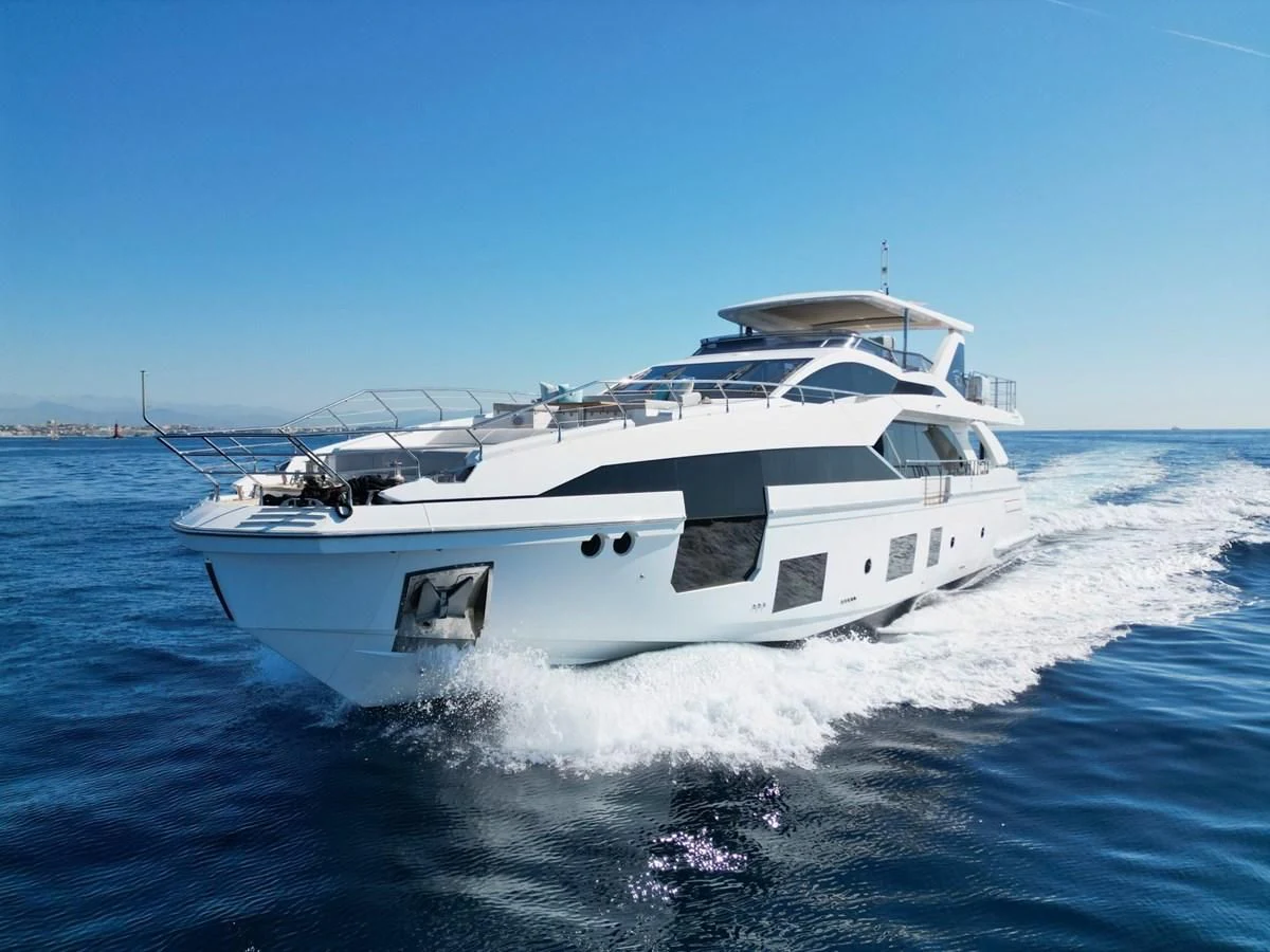 a white yacht on the water aboard GRANDE 27M Yacht for Sale