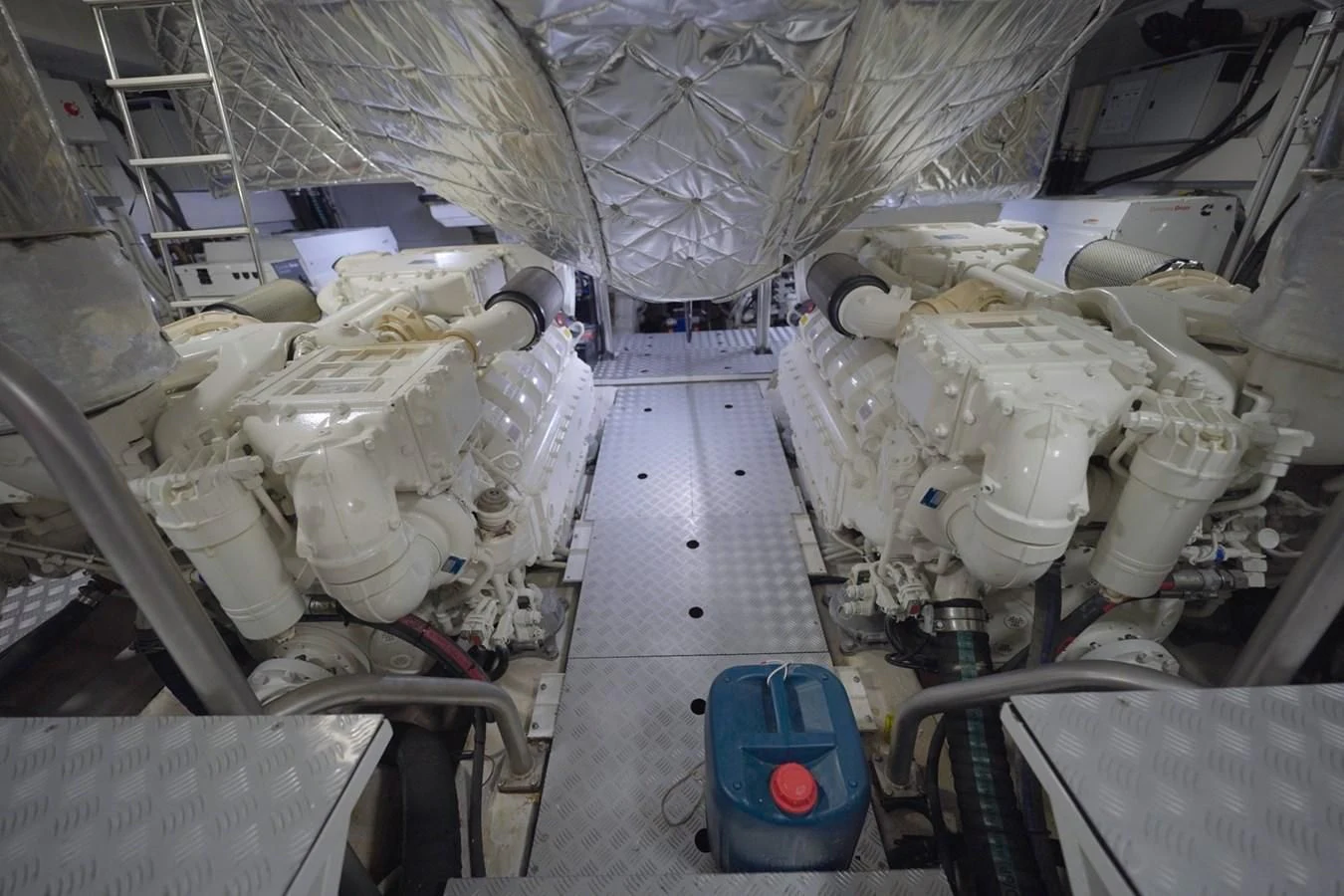 a large room with white machines aboard GRANDE 27M Yacht for Sale
