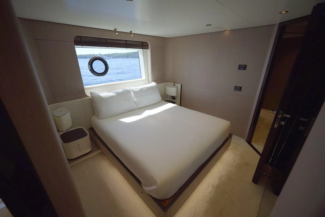 a bed in a room aboard GRANDE 27M Yacht for Sale