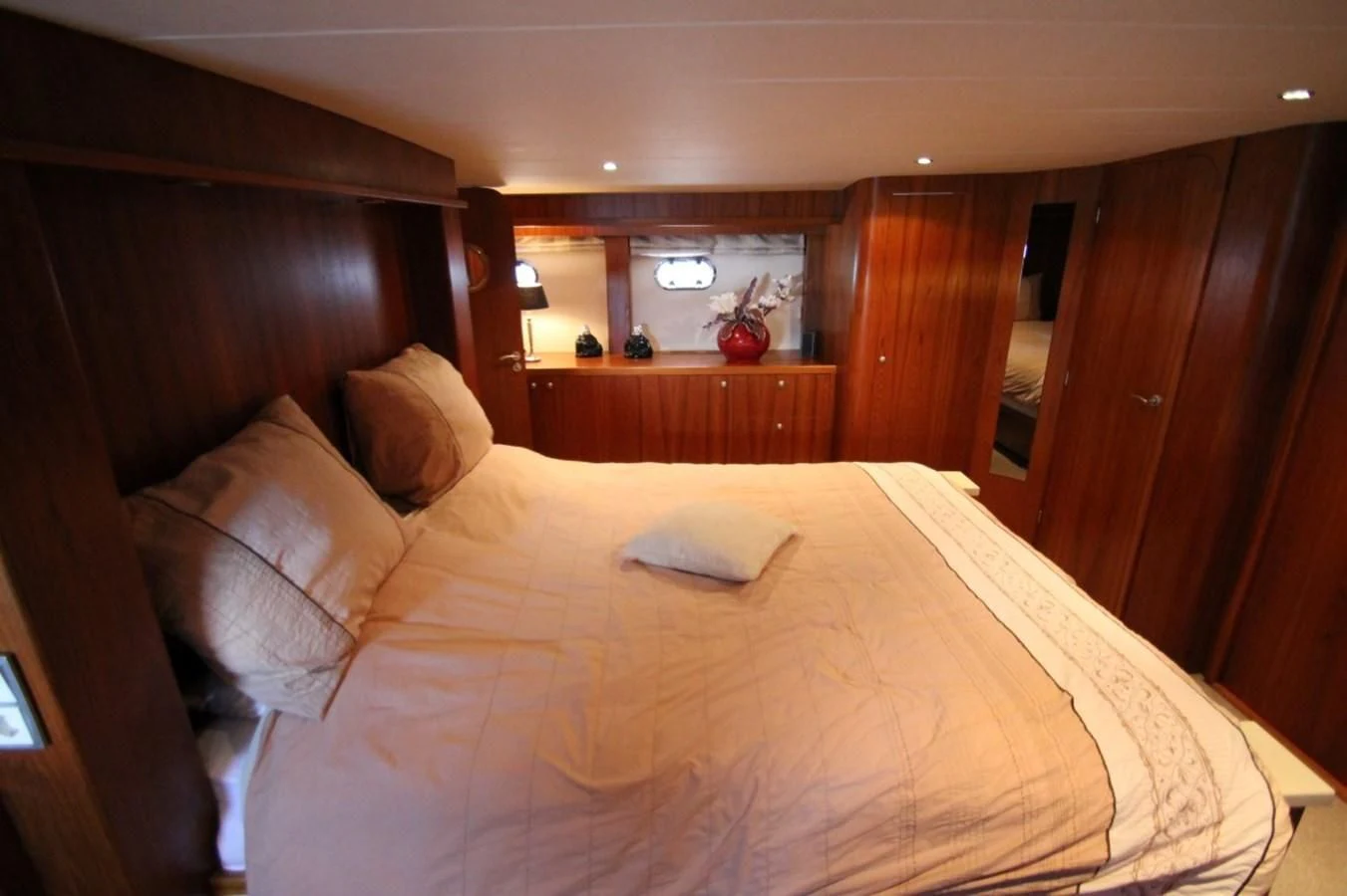a bed in a room aboard ELISABETH Yacht for Sale