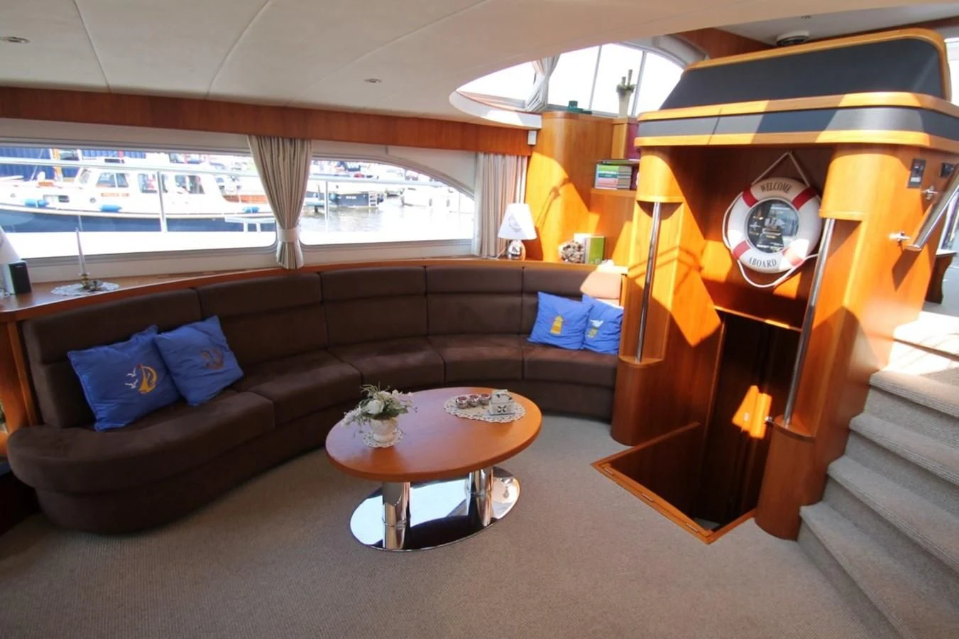 a living room with a couch and a coffee table aboard ELISABETH Yacht for Sale
