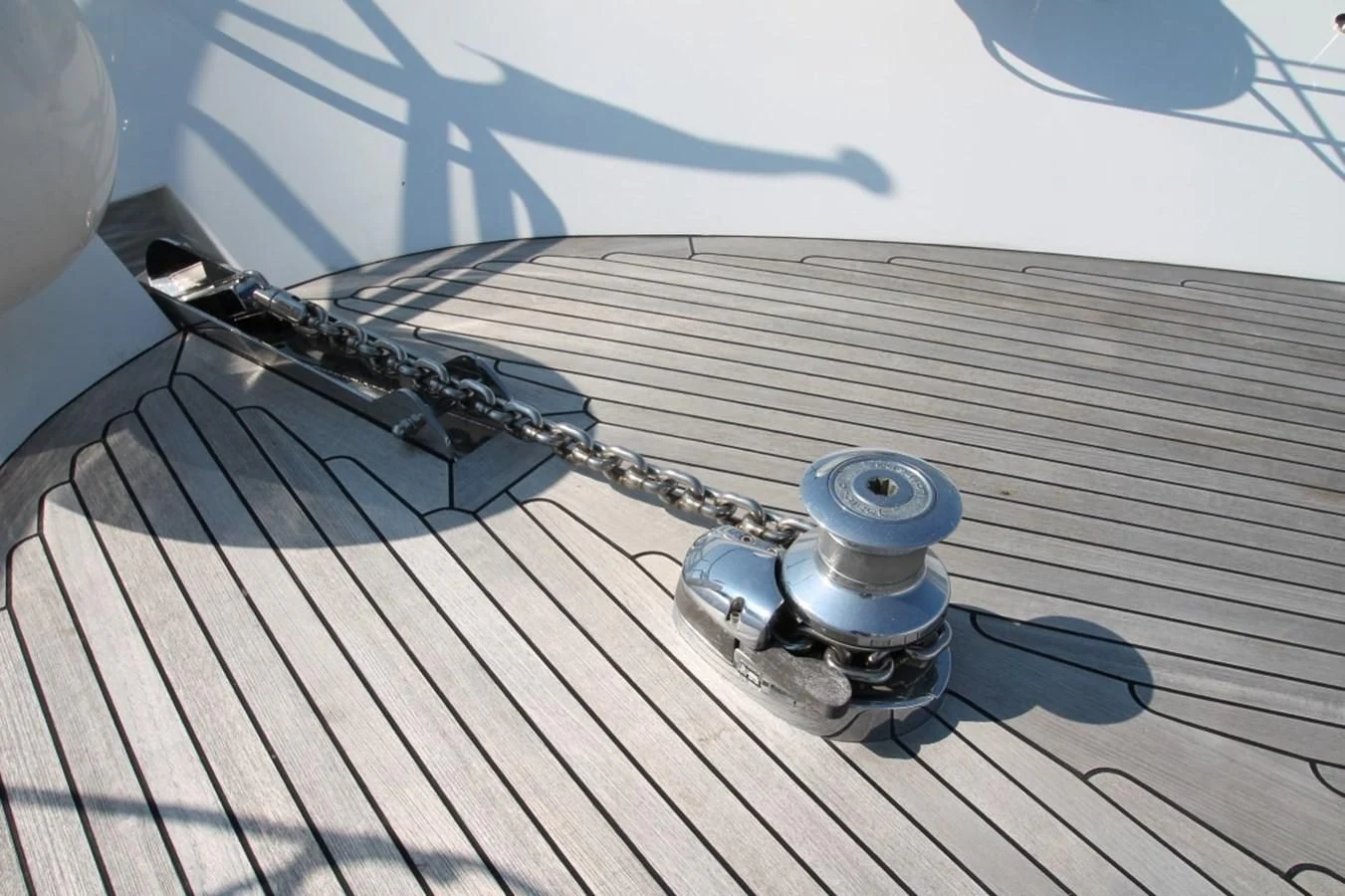a guitar on a wooden surface aboard ELISABETH Yacht for Sale