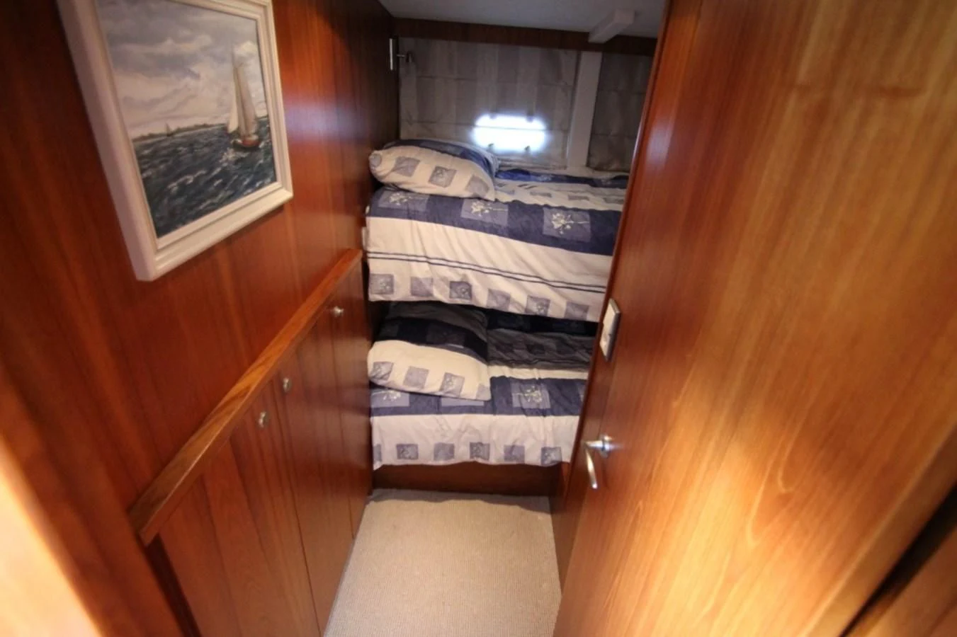 a bed in a room aboard ELISABETH Yacht for Sale