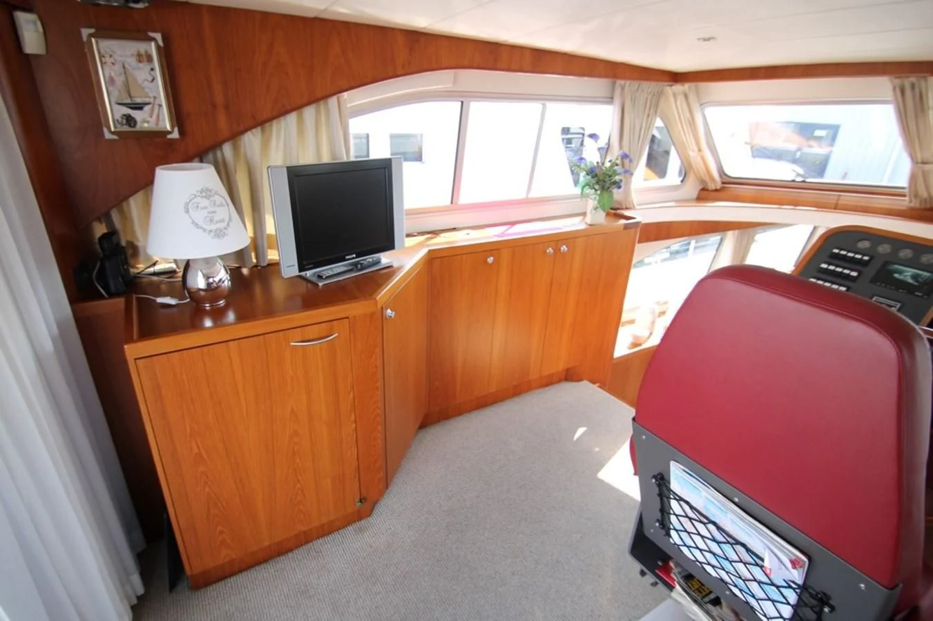 a bedroom with a desk and a tv aboard ELISABETH Yacht for Sale