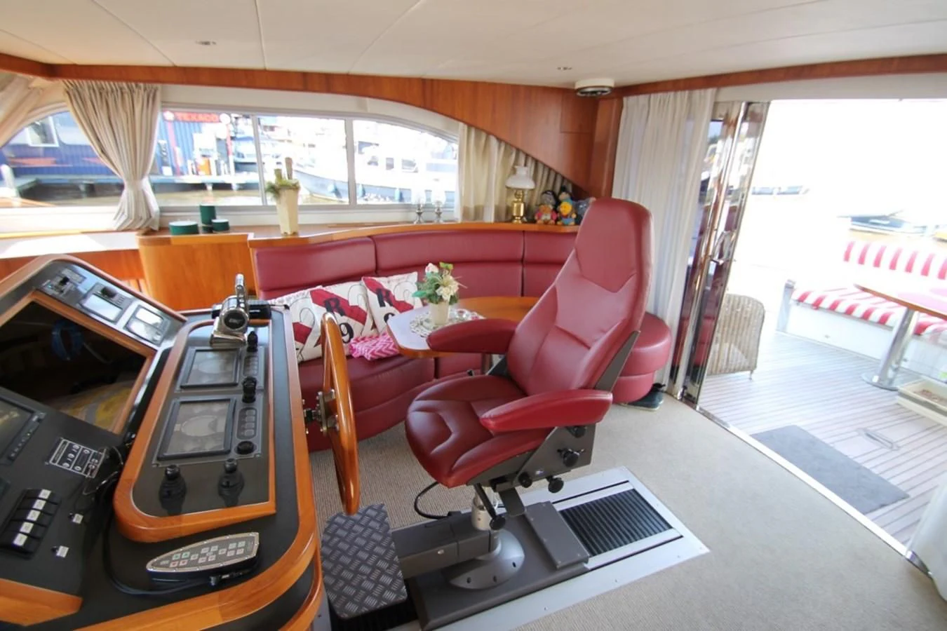 a room with a table chairs and a window aboard ELISABETH Yacht for Sale
