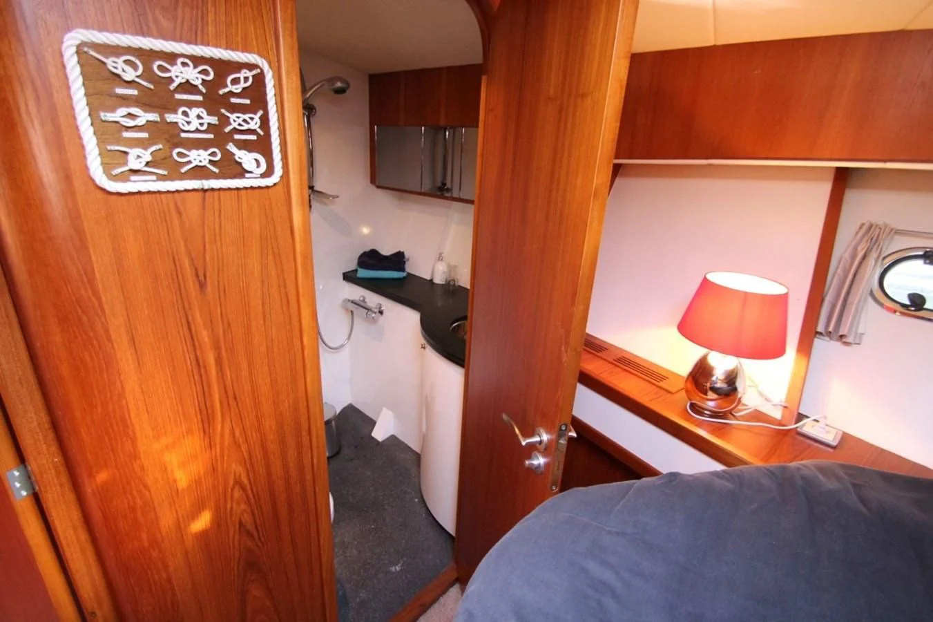 a room with a bed and a desk aboard ELISABETH Yacht for Sale