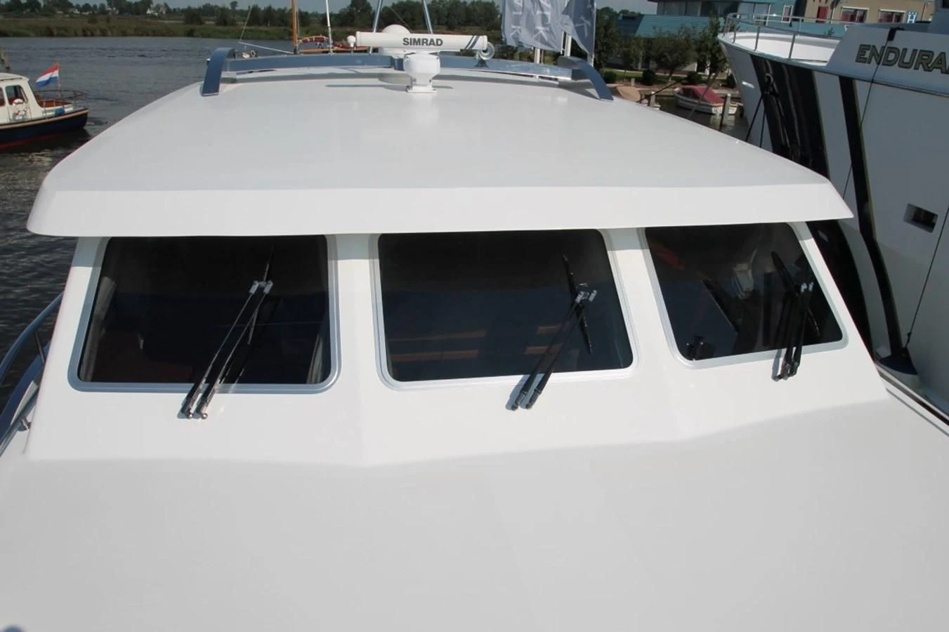 a white boat with a white roof aboard ELISABETH Yacht for Sale