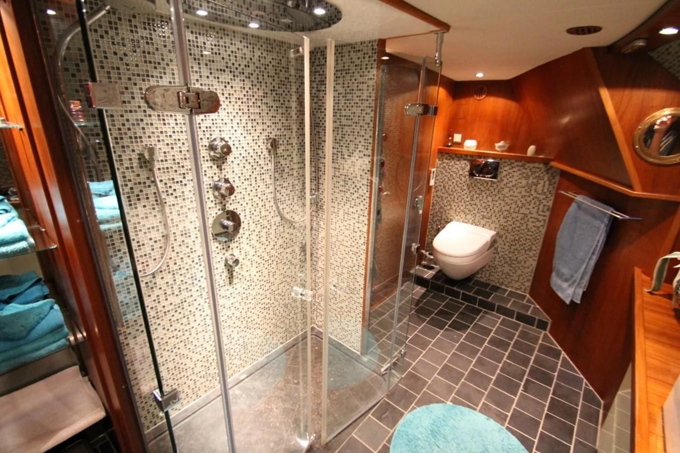 a bathroom with a glass shower aboard ELISABETH Yacht for Sale