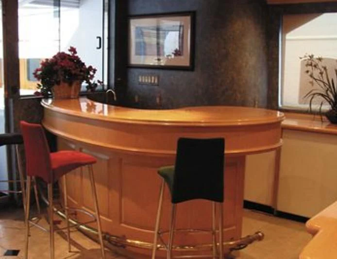 a table with chairs around it aboard ESTANCIA Yacht for Sale