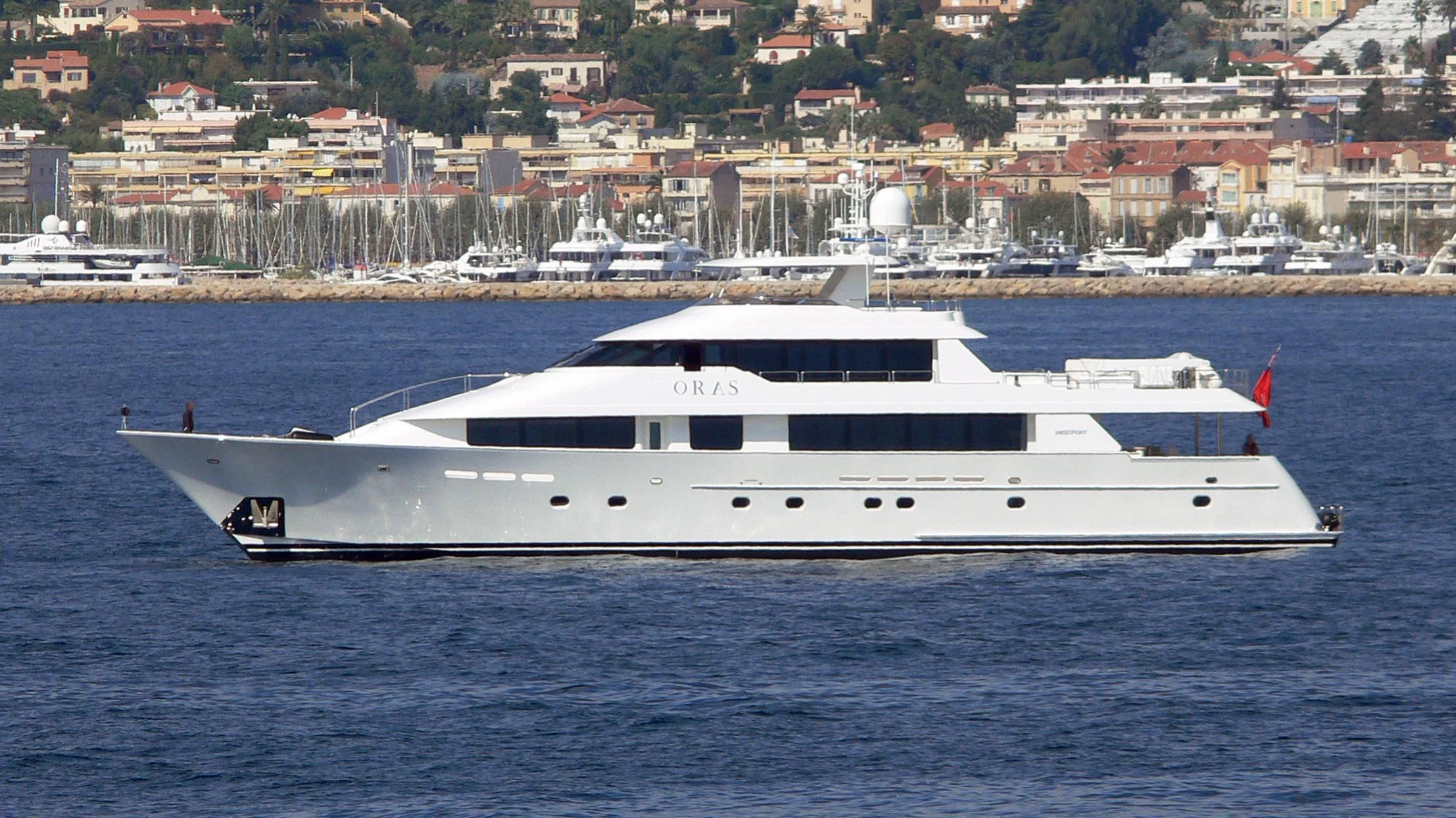 a white yacht in the water aboard FREE SPIRIT Yacht for Sale
