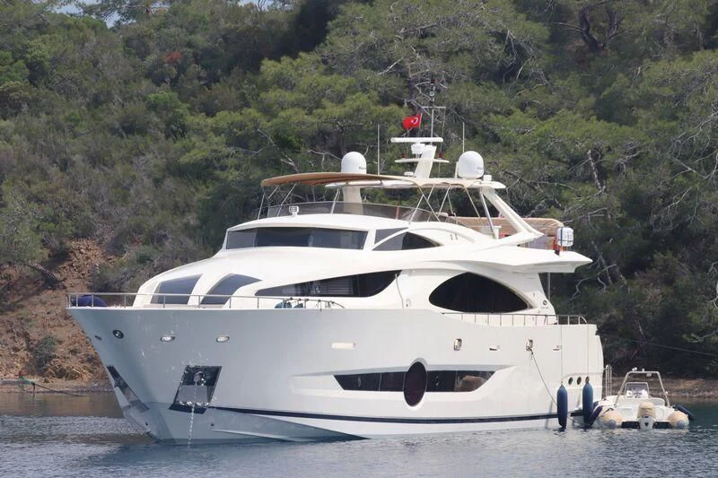 a white yacht on the water aboard POMALIS Yacht for Sale