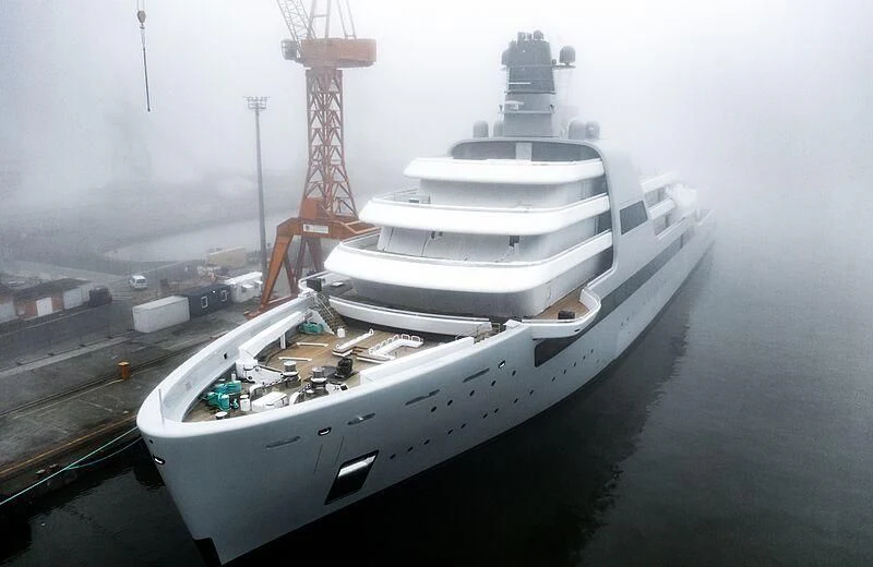 a large white boat on a body of water aboard SOLARIS Yacht for Sale