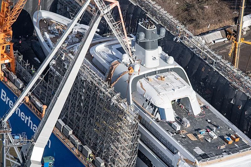 a large factory with a large crowd of people aboard SOLARIS Yacht for Sale