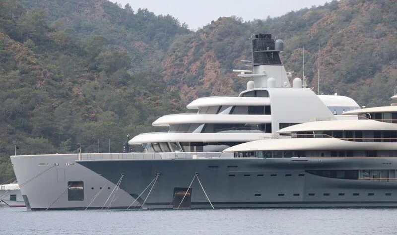 a large boat in the water aboard SOLARIS Yacht for Sale