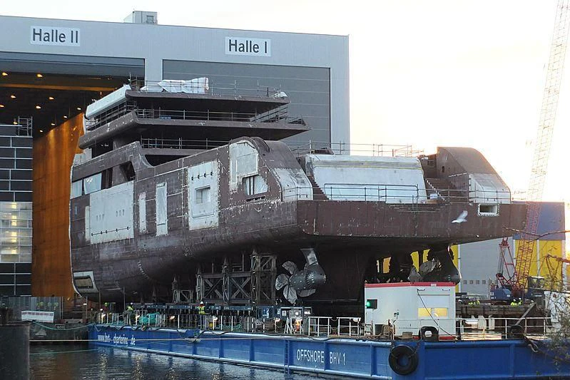 a large ship docked aboard SOLARIS Yacht for Sale