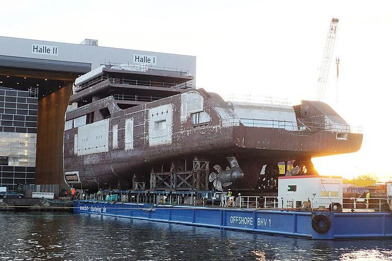 a large ship docked aboard SOLARIS Yacht for Sale