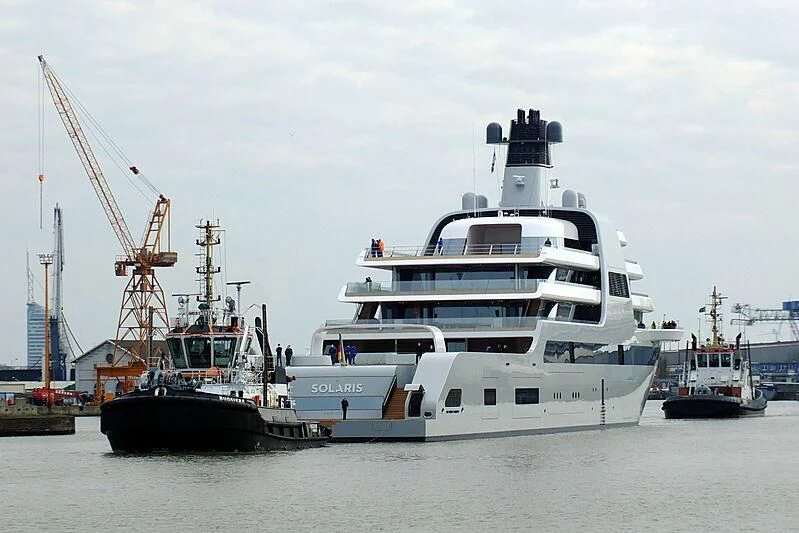 a large white boat with a crane aboard SOLARIS Yacht for Sale