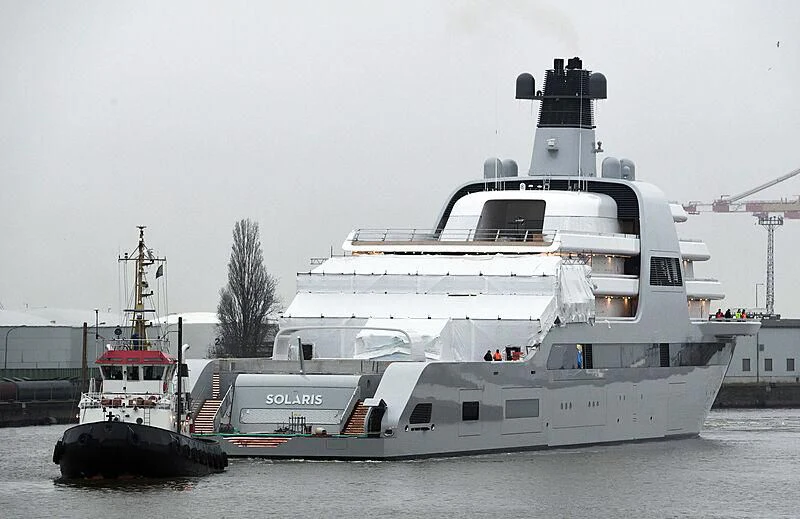 a large white ship aboard SOLARIS Yacht for Sale